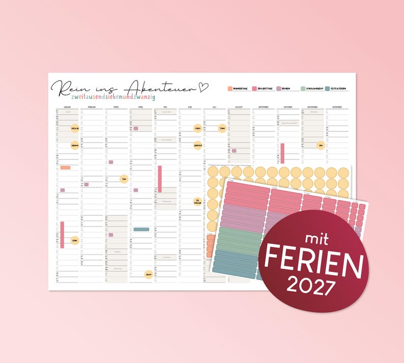 May include: A white wall calendar for the year 2027 titled Rein ins Abenteuer with the subtitle zweitausendsevenundzwanzig. The calendar features twelve monthly columns with grid lines and includes a sheet of colorful round and rectangular stickers.