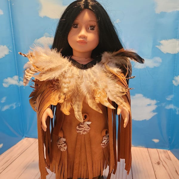 18 inch doll clothing, Native American influence. 2 piece set for 18 inch doll includes dress and boots. Dress is embellished with shells.