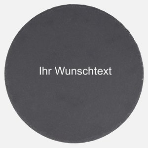 Könnte beinhalten: Ein rundes, schwarzes Schiefer-Servierbrett mit dem Text "Ihr Wunschtext" in weiß.