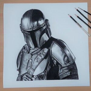 May include: A black and white pencil drawing of a Mandalorian character from the Star Wars franchise. The character is wearing a helmet and armor, and is holding a weapon. The drawing is on a white background.