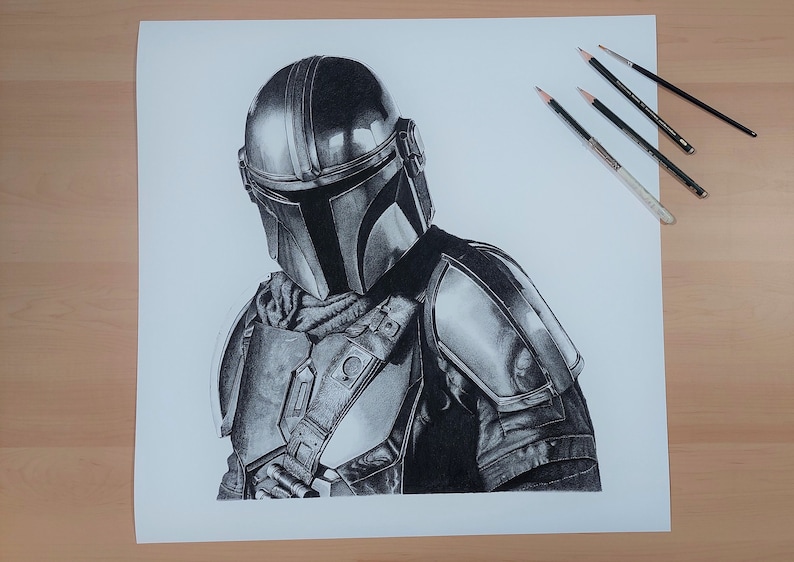 May include: A black and white pencil drawing of a Mandalorian character from the Star Wars franchise. The character is wearing a helmet and armor, and is holding a weapon. The drawing is on a white background.