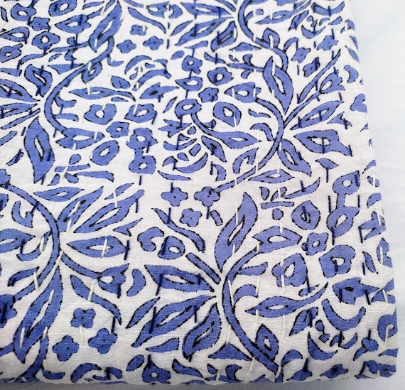 Handmade blue floral Kantha quilt with white base and hand block print design, hand-stitched by Jaipur artisans — perfect for bohemian Quilt