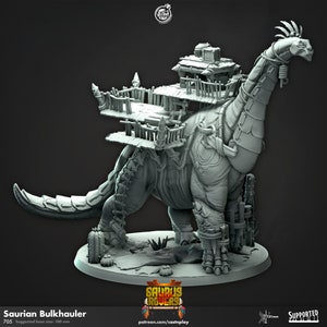 May include: A detailed gray Saurian Bulkhauler miniature, a dinosaur-like creature with a wooden structure on its back. The model features intricate details, including ropes, armor, and a base with desert plants. The text "Saurus Rovers" is visible.
