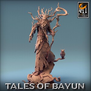 May include: A detailed miniature figurine of a tree-like creature with a long beard and a staff. The creature is standing on a base with roots and branches. A small owl is perched on a branch above the creature.