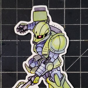 May include: A green and yellow cartoon robot with a yellow blade weapon. The robot has a blue visor and is holding the weapon in its right hand.