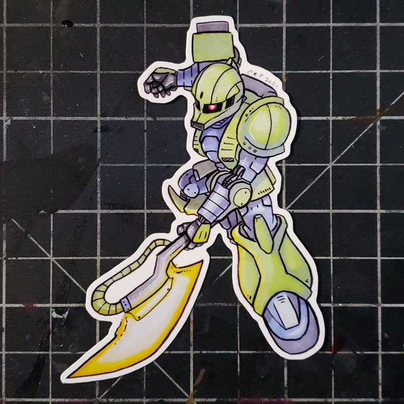 May include: A green and yellow cartoon robot with a yellow blade weapon. The robot has a blue visor and is holding the weapon in its right hand.