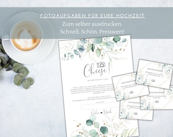 May include: A printable set of wedding photo booth game cards with a green and gold floral design. The cards feature the text "Cheese!" and "Bilder für die Ewigkeit" (German for "Pictures for Eternity").