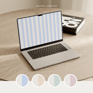 Può includere: Un laptop argentato con tastiera nera e schermo con strisce verticali blu e bianche. Il laptop è su una superficie in legno chiaro. Sullo sfondo è visibile un libro nero con testo bianco. Il testo "NEUTRAL CONCEPT" è in alto.