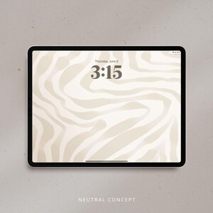 May include: A black tablet displays a neutral-toned zebra stripe pattern wallpaper. The time, 3:15, and date, Thursday, June 5, are visible at the top. The text "NEUTRAL CONCEPT" is at the bottom of the screen.