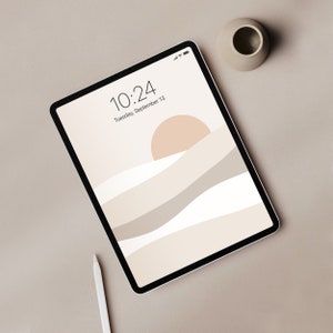 May include: A tablet computer displaying a minimalist digital art design with a stylized sun and waves in beige and white tones. The time is 10:24 and the date is Tuesday, September 13.