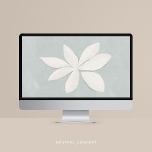 May include: A desktop computer displays a white flower design on a light blue background. The flower has six petals. The words "NEUTRAL CONCEPT" are at the bottom of the screen.