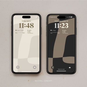 May include: Two black smartphones with neutral colored abstract backgrounds. The phone on the left displays the time 11:48 and the date Friday, April 5. The phone on the right displays the time 11:23 and the date Friday, November 10.