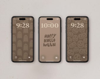 May include: Three smartphones displaying digital wallpapers in shades of brown. The left screen shows a ghost pattern, the center screen displays the text HAPPY HALLOWEEN, and the right screen features a pattern of jack-o'-lanterns with carved faces.