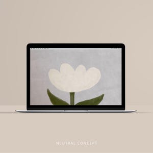 May include: A laptop displays a digital art print of a white tulip flower with green leaves and stem against a light blue background. The laptop is on a beige surface. The text "NEUTRAL CONCEPT" is at the bottom of the screen.
