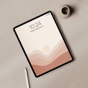 May include: A digital tablet with a beige background and a stylized illustration of a sunset over hills. The time is 10:24 and the date is Tuesday, September 13.