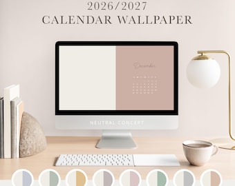 May include: A computer monitor displaying a 2026/2027 calendar wallpaper with a split-tone cream and dusty rose background. The screen shows the month of December. Below the monitor is a white keyboard, a ceramic mug, and a lamp.