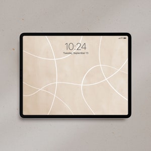 May include: A digital tablet with a beige background and white abstract lines. The time is 10:24 and the date is Tuesday, September 13.