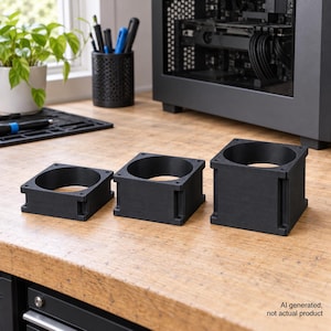 May include: Three matte black, square-shaped fan shrouds of varying heights, each featuring a circular center opening and four corner screw holes. The text "AI generated, not actual product" is printed in the bottom right corner of the image.