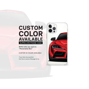 May include: A clear phone case featuring a red sports car design. The case has a white border and text that reads "CUSTOM COLOR AVAILABLE SUPRA A90 PHONE CASE". The image is set against a white background.