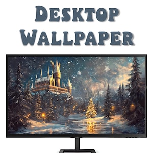 May include: A computer monitor displaying a winter scene with a castle in the background, snow falling, and a Christmas tree in the foreground.