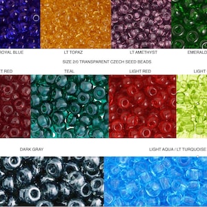 May include: A collection of transparent Czech seed beads in various colors, including cobalt blue, garnet red, and emerald green. The image displays the colors with text labels: "COBALT / ROYAL BLUE", "GARNET RED", "LT AMETHYST", "EMERALD GREEN", "LT TOPAZ", "TEAL", "LIGHT RED", "LIGHT GREEN", "DARK GRAY", and "LIGHT AQUA / LT TURQUOISE".