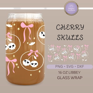 May include: A clear glass with a brown liquid inside, decorated with pink bows, cherries, skulls, and stars. The text "CHERRY SKULLS" is displayed, along with "PNG SVG DXF" and "16 OZ LIBBEY GLASS WRAP".