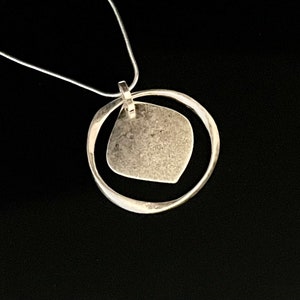 Very long circle pendant necklace