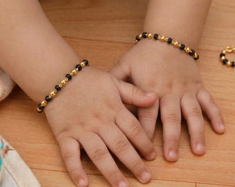 Bracelet bébé Nazariya en or massif 22 carats 91,6 % | Protection des yeux perlées noires | Du nouveau-né à 3 ans | Cadeau indien de baby shower