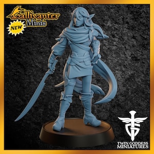 May include: A light blue resin miniature figure of an elf warrior standing on a circular base. The figure wears a scarf, tunic, and boots, and holds a curved sword in the right hand. Text on the image reads Gallivanter Minis, NEW, and Twin Goddess Miniatures.