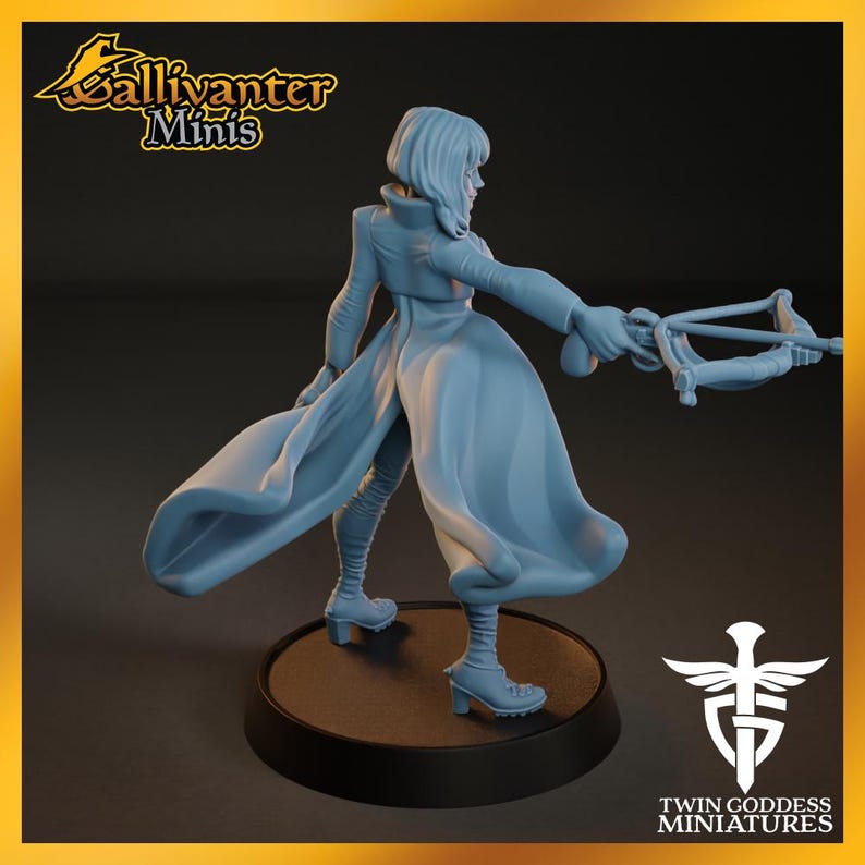 A figurine of a woman with flowing hair and a flowing dress, holding a weapon, is displayed on a platform.