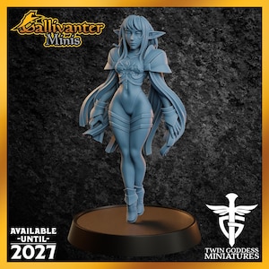 May include: A gray resin miniature figure of a long-haired elf-like character with pointed ears, wearing armor plating on the shoulders and chest, standing on a circular black base. Text includes Gallivanter Minis, Available Until 2027, and Twin Goddess Miniatures.
