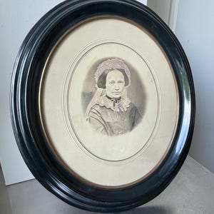 LARGE Antique Wooden Black Oval Picture Frame with portrait of a lady  40 cm x 35 cm