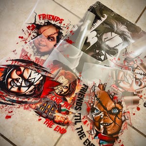 May include: Four different designs of iron-on transfers featuring a horror movie character with red and black accents. The text "Friends Til The End" is visible on one of the transfers.