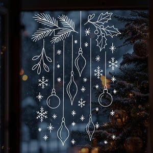 Puede incluir: Adhesivo de ventana de arte lineal blanco con adornos navideños, copos de nieve y ramitas de acebo y pino. El texto "PRINTABLE WINDOW ART" está a la izquierda. El adhesivo mide aproximadamente 36x56 cm.