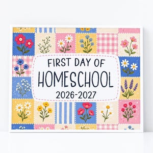 May include: A rectangular sign featuring a patchwork quilt design with various floral illustrations in pink, yellow, and blue. The center white panel displays the black text FIRST DAY OF HOMESCHOOL 2026-2027. The border consists of squares with gingham, striped, and solid patterns.