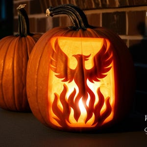 May include: Two orange pumpkins, one with a carved phoenix design and flames, illuminated from within. The other pumpkin is in the background. The words "PRINTABLE STENCIL" are on the left side of the image.