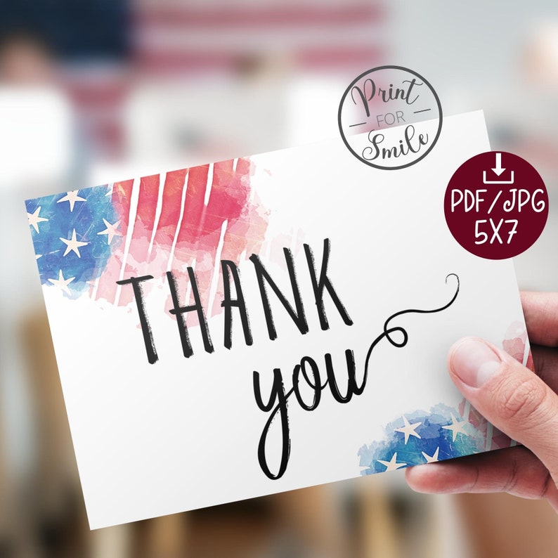 May include: A white card with the words "Thank you" in black script. The card has a watercolour background with red, white, and blue stripes, reminiscent of the American flag.
