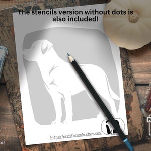 May include: A white stencil of a dog on a gray background, with the text "The stencils version without dots is also included!" A black pencil rests on the paper. The image is on a wooden surface.