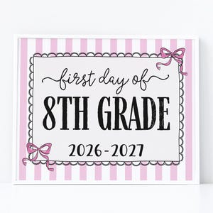 May include: A rectangular sign with a light pink and white vertical striped border. The center features a white background with a black scalloped frame, pink bows, and the black text: first day of 8TH GRADE 2026-2027. The bottom right corner has the text Print For Smile.