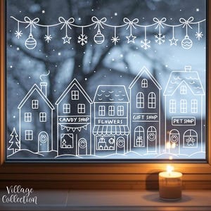 Puede incluir: Una impresión artística para ventana que presenta una escena de un pueblo invernal con casas, tiendas y decoraciones festivas delineadas. Las palabras "PRINTABLE WINDOW ART" y "Village Collection" son visibles. Una vela encendida está debajo.