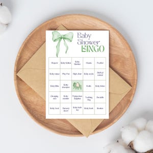 Bingo de regalos para baby shower: actividad de baby shower con lazo verde neutro para invitados
