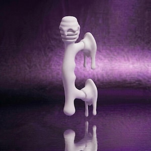 May include: A white door handle with a unique melting effect design. The handle features a vertical grip with two circular mounting plates that appear to have white liquid dripping down from them, creating a smooth, continuous, and fluid appearance.