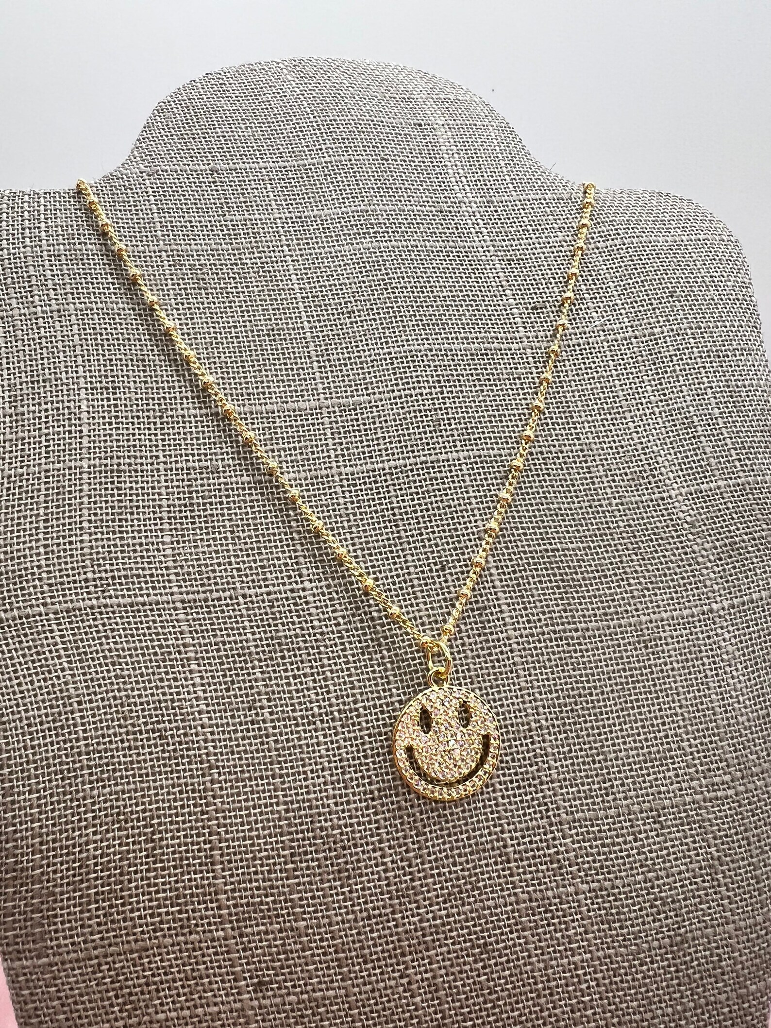Smiley face necklace gold Clearance