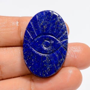 Cabochon ovale di lapislazzuli Occhio di cristallo di lapislazzuli blu intagliato Occhio di cristallo curvo blu 33X22X5 mm Pietra intagliata (retro piatto entrambi i lati lucidati)
