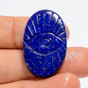 Cabochon ovale di lapislazzuli Occhio di cristallo di lapislazzuli blu intagliato Occhio di cristallo curvo blu 30X19X5 mm Pietra intagliata (retro piatto entrambi i lati lucidati)