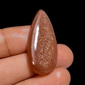 Pierre de lune pêche polie lisse en forme de poire 34 x 15 x 4 mm taille pêche cristal