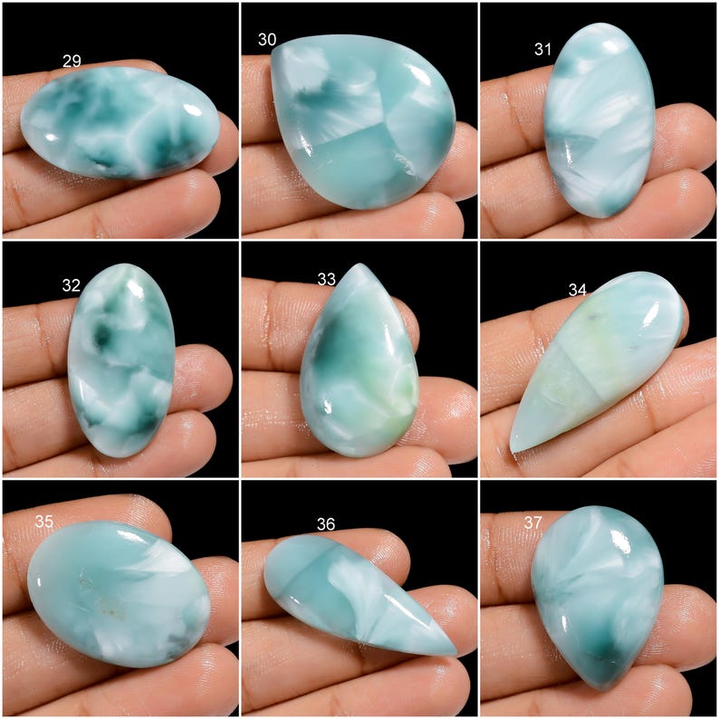 May include: Nine cabochon gemstones, each with a unique swirling pattern of blue, green, and white. The stones are numbered 29 through 37.