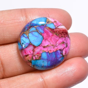 Cabochon épineux en cuivre turquoise de forme ronde, poids de 33,5 carats, dimension 25 x 25 x 6 mm.