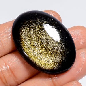Goldener Schimmer-Obsidian Edelstein Oval Form Goldener Feuerkristall 36X25X5 mm Größe Goldener Obsidianstein