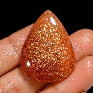 Natuurlijke zonnesteen cabochon grote druppelvorm zonnesteen 33 x 25 x 6 mm Afrikaanse zonnesteen kristal